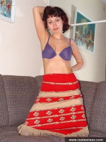 Teen brunette posing in black stocking