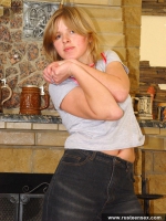 Russian teen blonde masturbates near fireplace