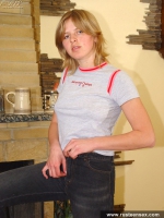 Russian teen blonde masturbates near fireplace