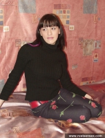 Russian teen brunette shows her naked body