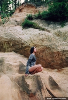 Russian teen outdoor naked posing on the cliff