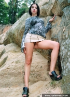 Russian teen outdoor naked posing on the cliff