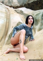 Russian teen outdoor naked posing on the cliff