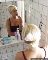 Russian teen blonde posing in the toilet room