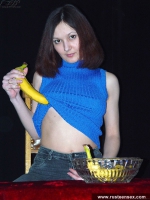 Russian cute teen brunette teasing her pussy with banana