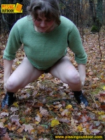 Outdoor pissing on dry leaves