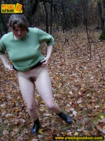 Outdoor pissing on dry leaves