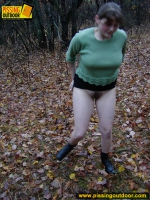 Outdoor pissing on dry leaves