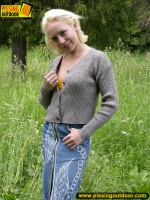 Pissing outdoor in the grass