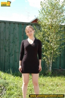 Teen brunette pisses outdoor