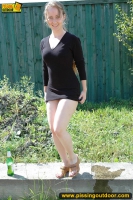 Teen brunette pisses outdoor