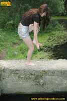 Pissing in the black pool outdoor