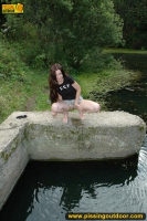 Pissing in the black pool outdoor