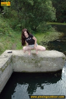 Pissing in the black pool outdoor