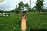Outdoor pissing on a park slide