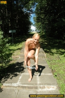 Pissing outdoor during sunbath