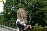 Outdoor pissing of prank blonde on a concrete area