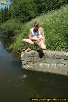 Outdoor pissing in the summer park pool