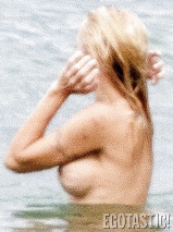 Pamela Anderson Goes Topless on a Beach in France