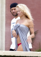 Pamela Anderson Goes Topless on a Beach in France