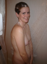 American couple posing to ranch