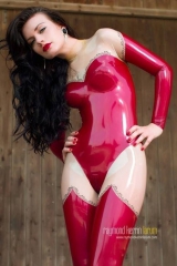 Latex lesbian oiled