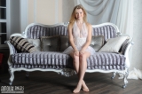 Innocent teen on sofa