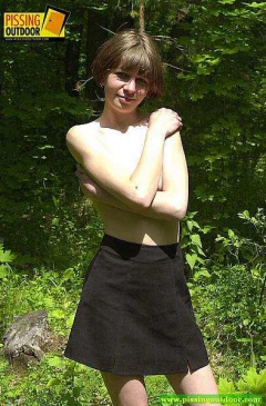 Peeing girl in forest - N
