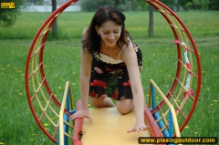 Outdoor pissing on a park slide - N
