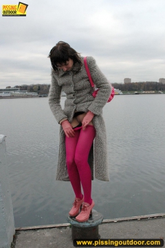 Outdoor pissing on embankment by MILF brunette - N