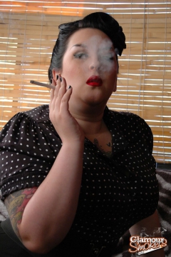 Busty babe posing sexy while smoking - N
