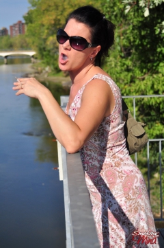 Brunette babe smoking at the riverside - N
