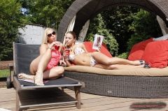 Two bikini babes are - N