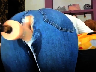 MILF in Ripped Jeans Fucks Machine Dick