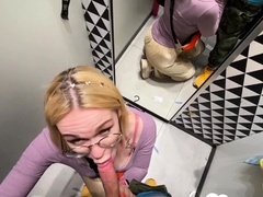 Gf gives a blowjob in the changing booth