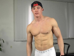 Handsome twink Larry McCormick flex his abs