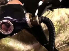 Solo rubber suit gas mask dildo play