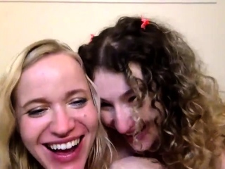 Blonde and brunette lesbian teen belles play